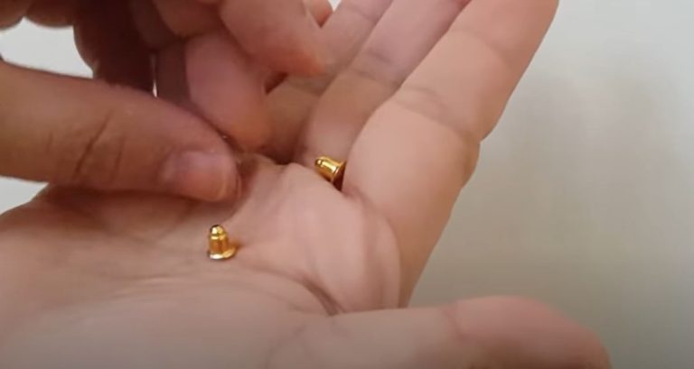 how to get a stuck plastic earring back off